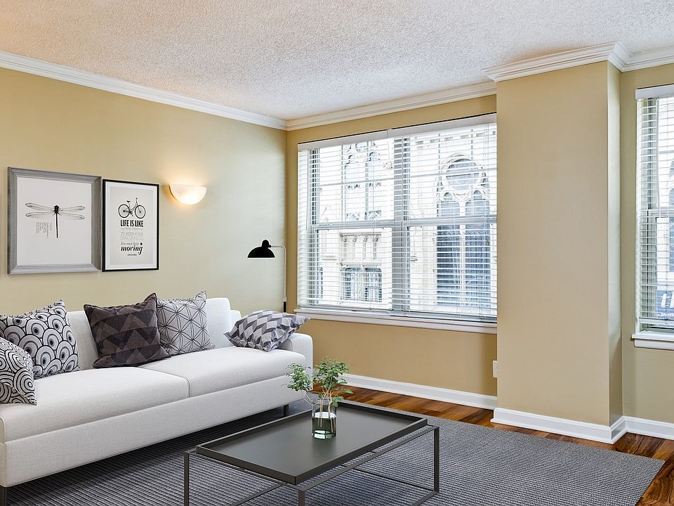 Spacious living room provides ample natural light