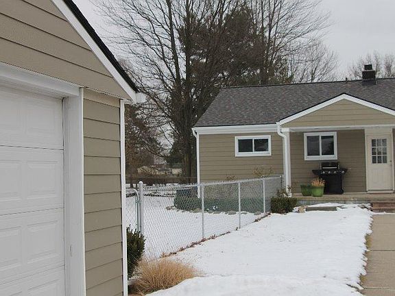 Fenced in yard & rear of home