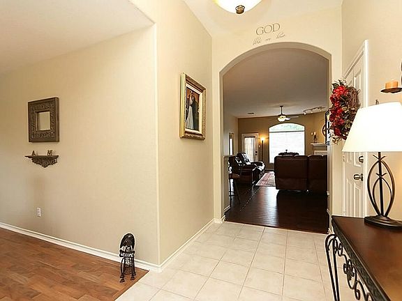Beautiful Tiled Entry with High Ceilings & Interesting Architectural Details