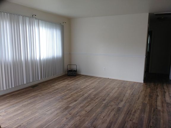 Living Room with Laminate flooring.