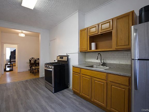 5th image of 6089 54th St Floor 2