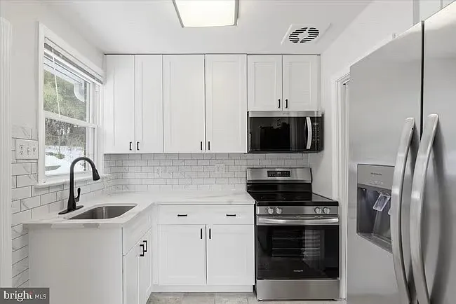 9704 Lorain Ave — Photo 1