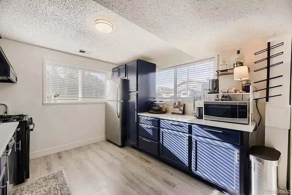 7056 W Rowland Ave — Photo 4