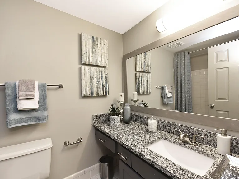Bright bathroom with granite counters