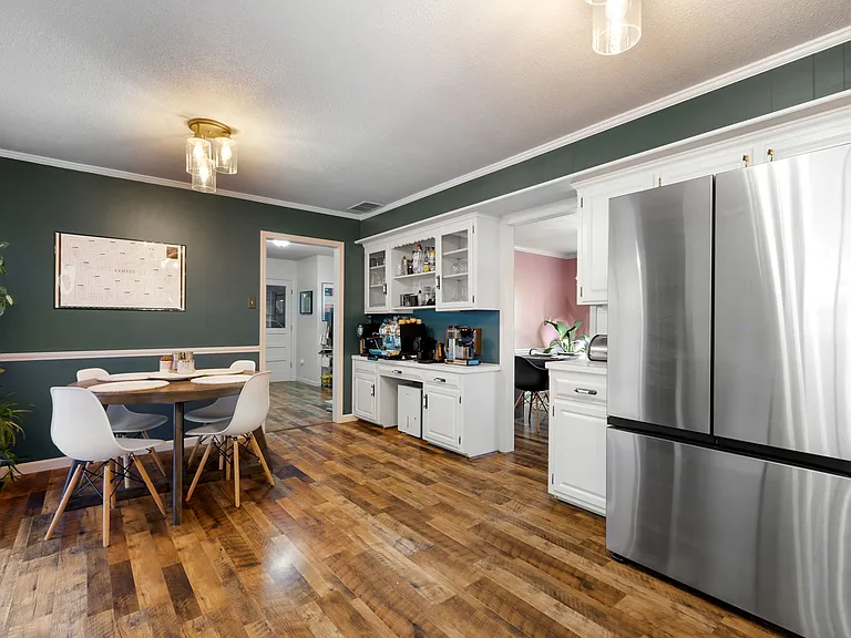 Kitchen features a kitchen nook, optional desk space, all new fixtures, plenty of counter space, and a Samsung bespoke, 3-drawer fridge with a beverage center