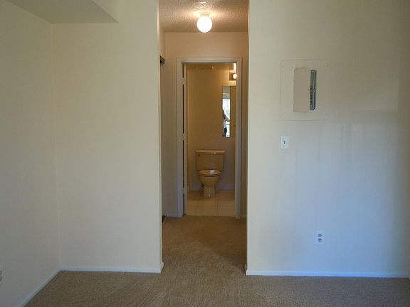Photo from Bedroom into Closet and Bathroom