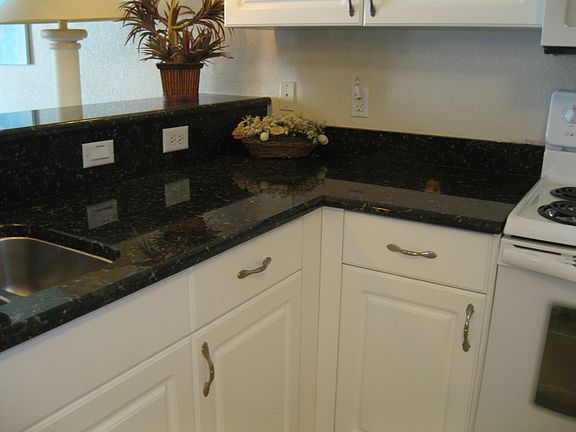 Granite  w white cabinets