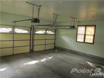 Nice 2 car garage with side door exit.