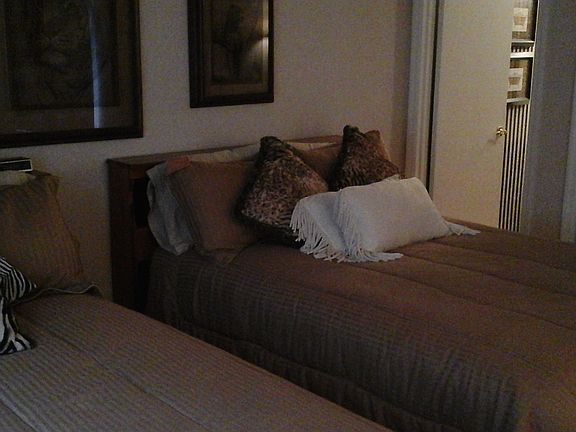 master bedroom with 2 full beds