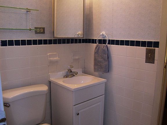 Updated half bath adjoined to master bedroom
