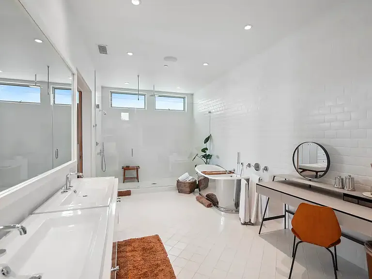 Dual vanities in the Master Bathroom for ample counter space and storage.