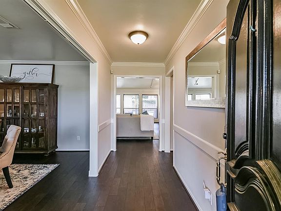As soon as you open the door you are greeted by beautiful Engineered Wood Floors that were just installed in October of 2019.