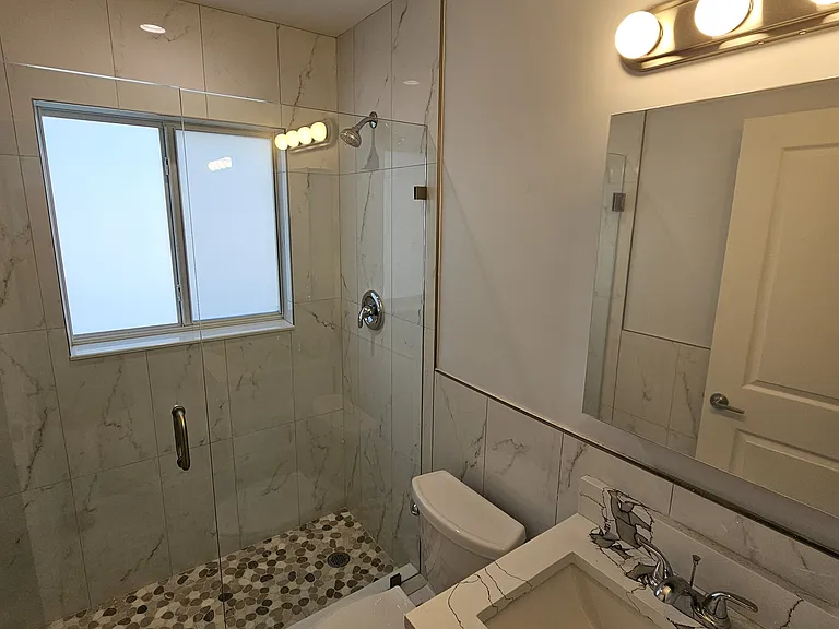 Styleish countertop patterns. 
Medicen cabinate mirrored inside and out.