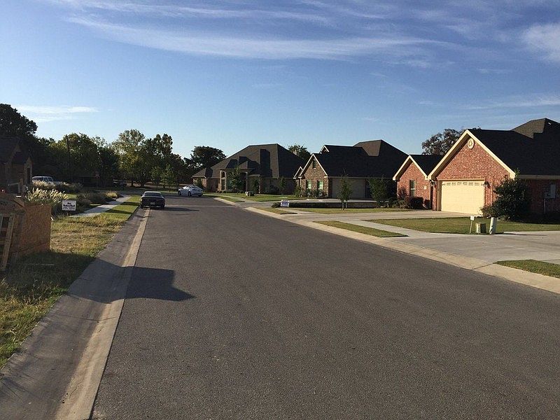 Street Scene
						:
						Golf course to the right, 111 Green Acres is on the left