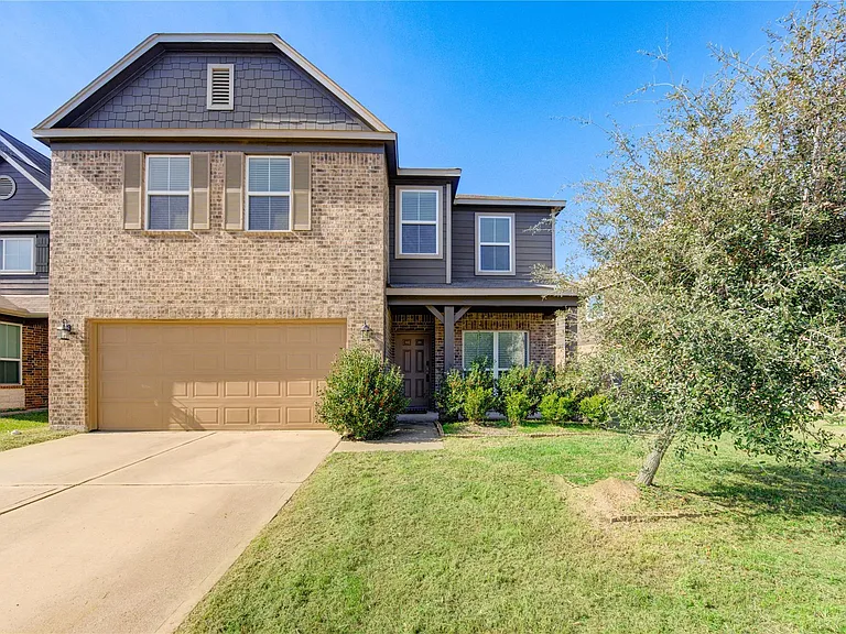 10907 Woodland Leaf Ln — Photo 1