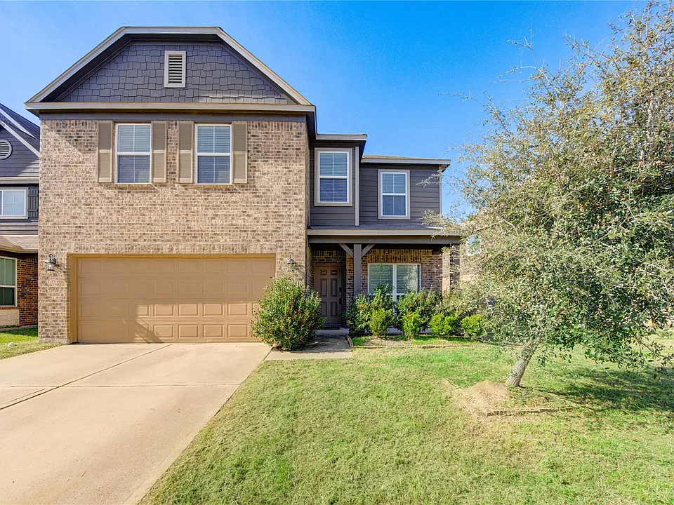 10907 Woodland Leaf Ln