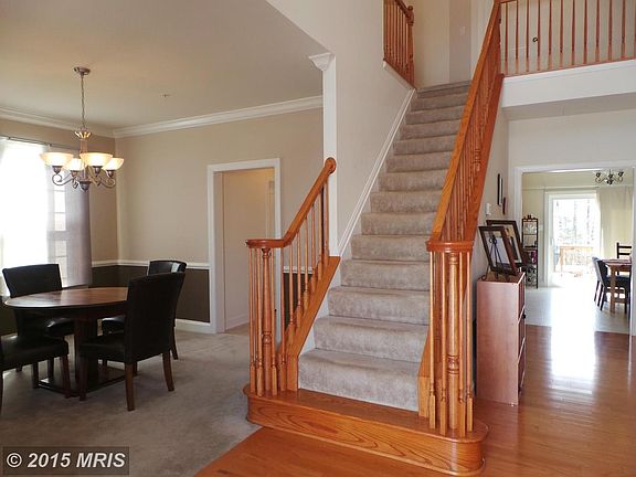 Impressive two story foyer with open floor plan