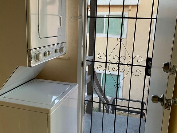 Laundry room with exit to rear shared yard