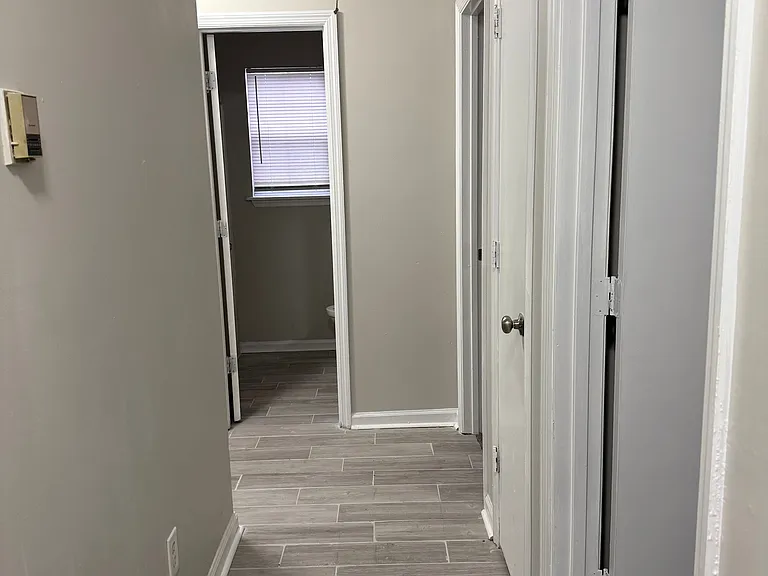 Bedrooms & Linen Closet on Right