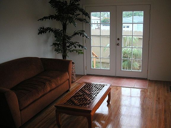 Refinished Wood Floors and New French Doors