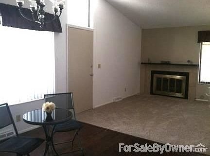 Living Room
						:
						Open floor plan, vaulted ceiling. Carpet, hardwood and window coverings are new.