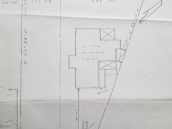 Property includes both lots 
