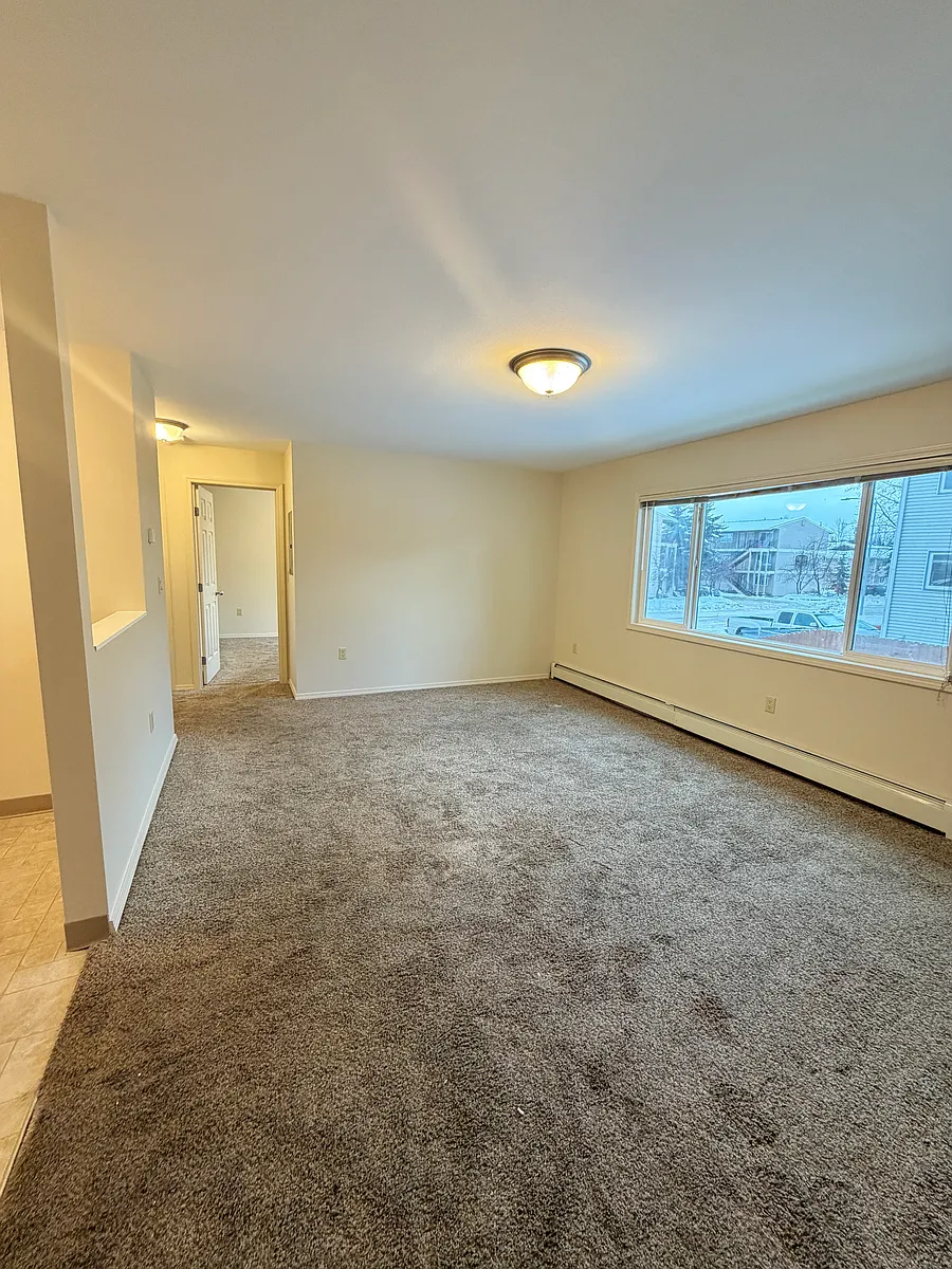 Building Photo - 3420 E 42nd Ave #4