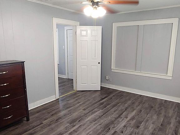 Bedroom 1 w closet and fireplace