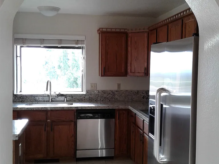 Archway from living room to kitchen