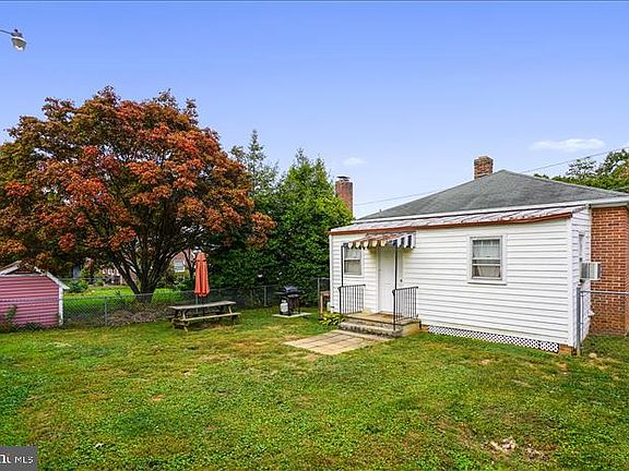 Large fenced rear yard, perfect for BBQ and pets!