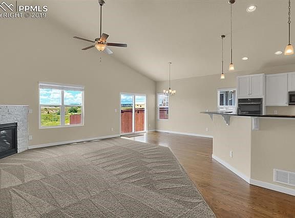 Spectacular Open Concept Great Room adjoining the Dining Area and Kitchen.