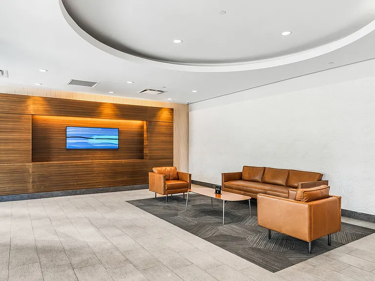 Welcome home to an elegant lobby that blends modern design with timeless sophistication