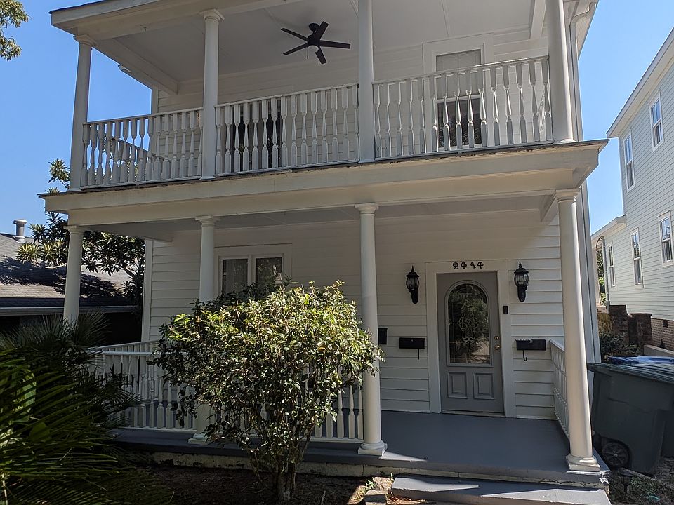 view to house, shows you top first and second floor porches