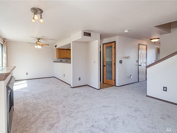 Dining room and kitchen with glass pantry door