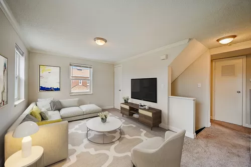Recently Renovated Townhouse Style Apartments featuring New gray carpet, Neutral paint scheme, Premium hardwood-style flooring, Neutral paint scheme, Upgraded light fixtures, New cabinets, Matching stainless steel appliances, Washer/Dryer, Air conditionin - SkyView