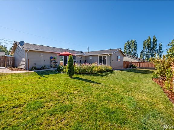 Beautifully landscaped backyard that is fully fenced.  Raised beds for those fresh vegetables and large patio for outdoor enjoyment.