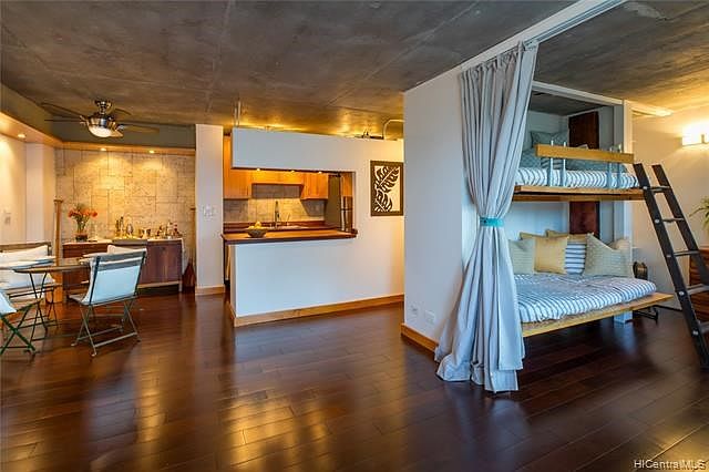 Gorgeous Brazilian Ipe hard wood floors throughout the condo. Exposed cement ceiling and mood lighting make his unit sparkle.
