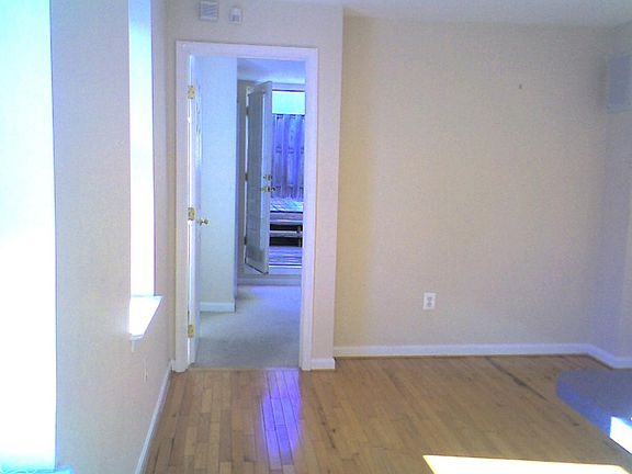 living room looking toward bedroom #2 and private deck