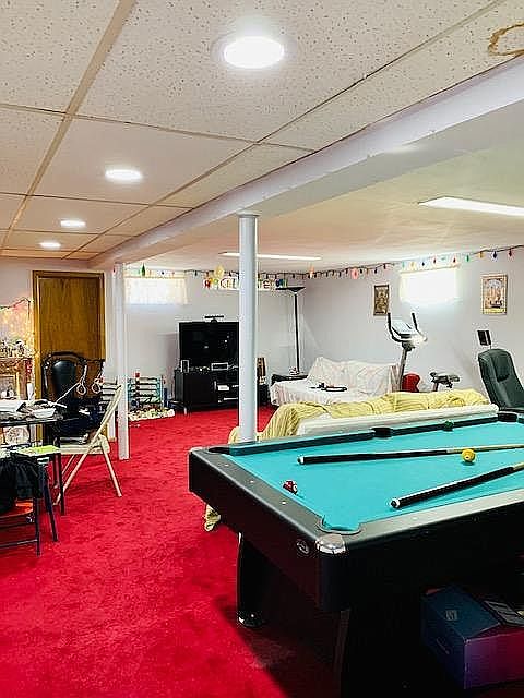 HUGE Finished Basement for additional Entertaining, sleeping space, and with water hook up. 2nd Full bathroom located downstairs as well. Great space as a multi-purpose Room.