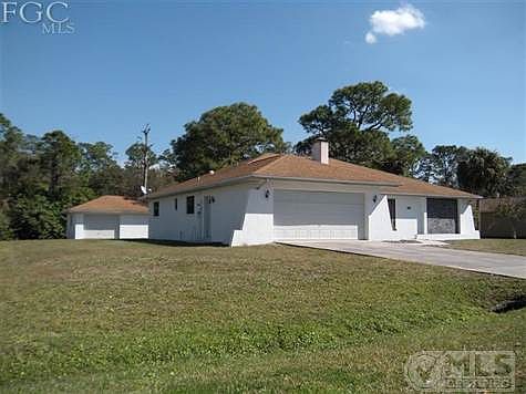 FRONT AND DETACHED GARAGE