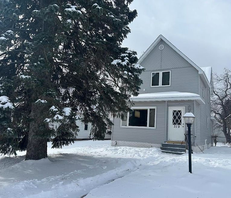 1st image of 319 N 61st Ave W