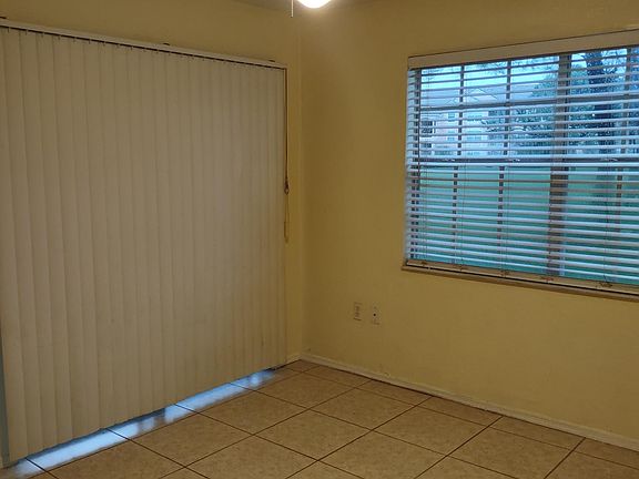 Master bedroom with walkout to back porch