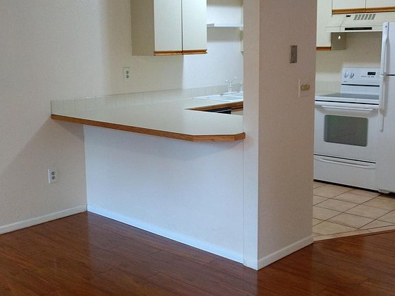 The vaulted ceiling in the living room and the eat-at counter