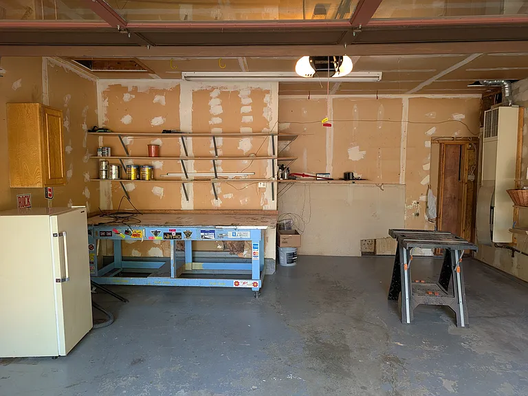 Front garage attached to house.