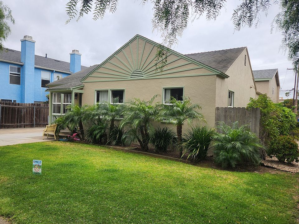 The unit is located in the 2 story house on the back.