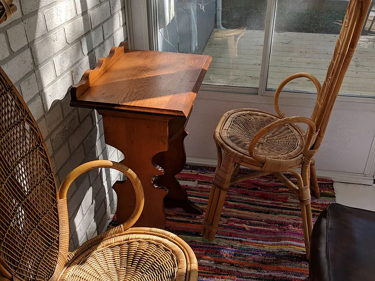 Reading nook in sunroom.