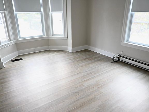 Bedroom is spacious with ample natural light