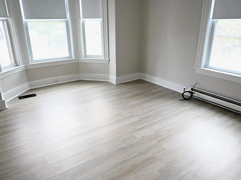 Bedroom is spacious with ample natural light