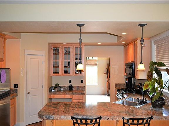 breakfast bar/kitchen looking into dining room