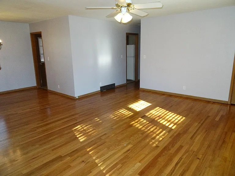 Living Room and Dining Room with no furniture